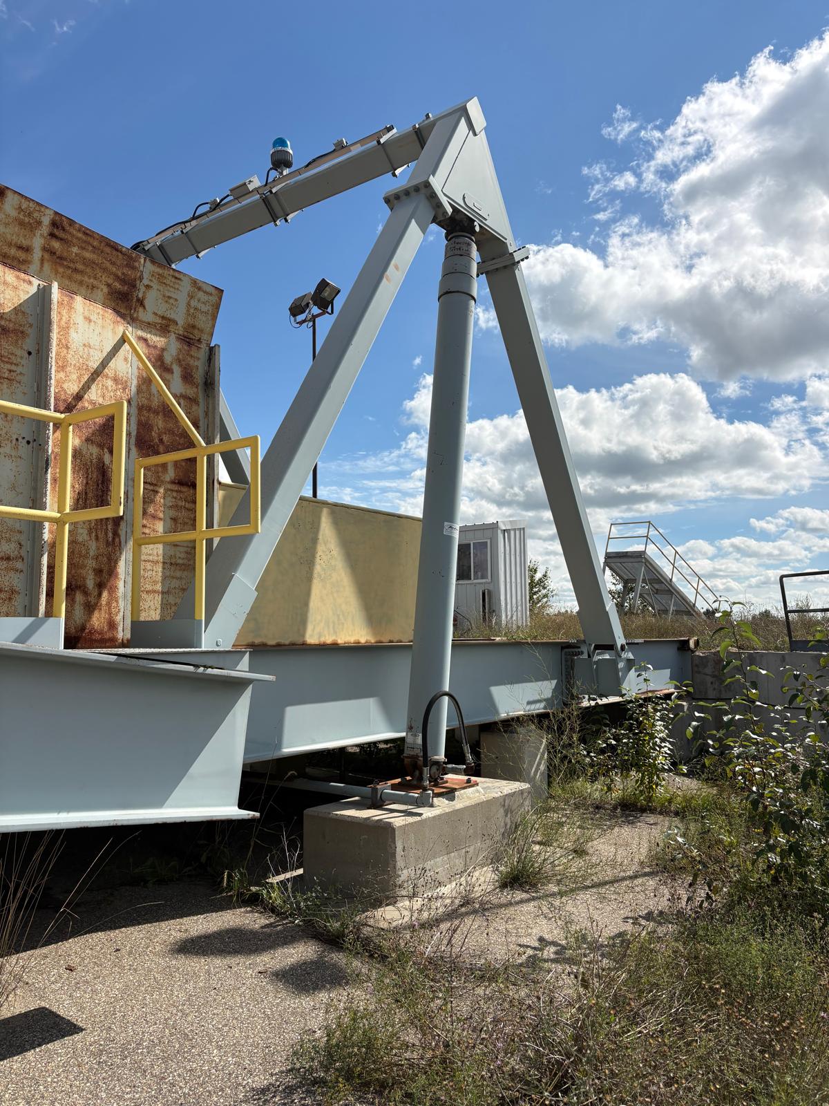 Airoflex 12-H-402-B-TS hydraulic truck dumper; receiving hopper excluded from sale.