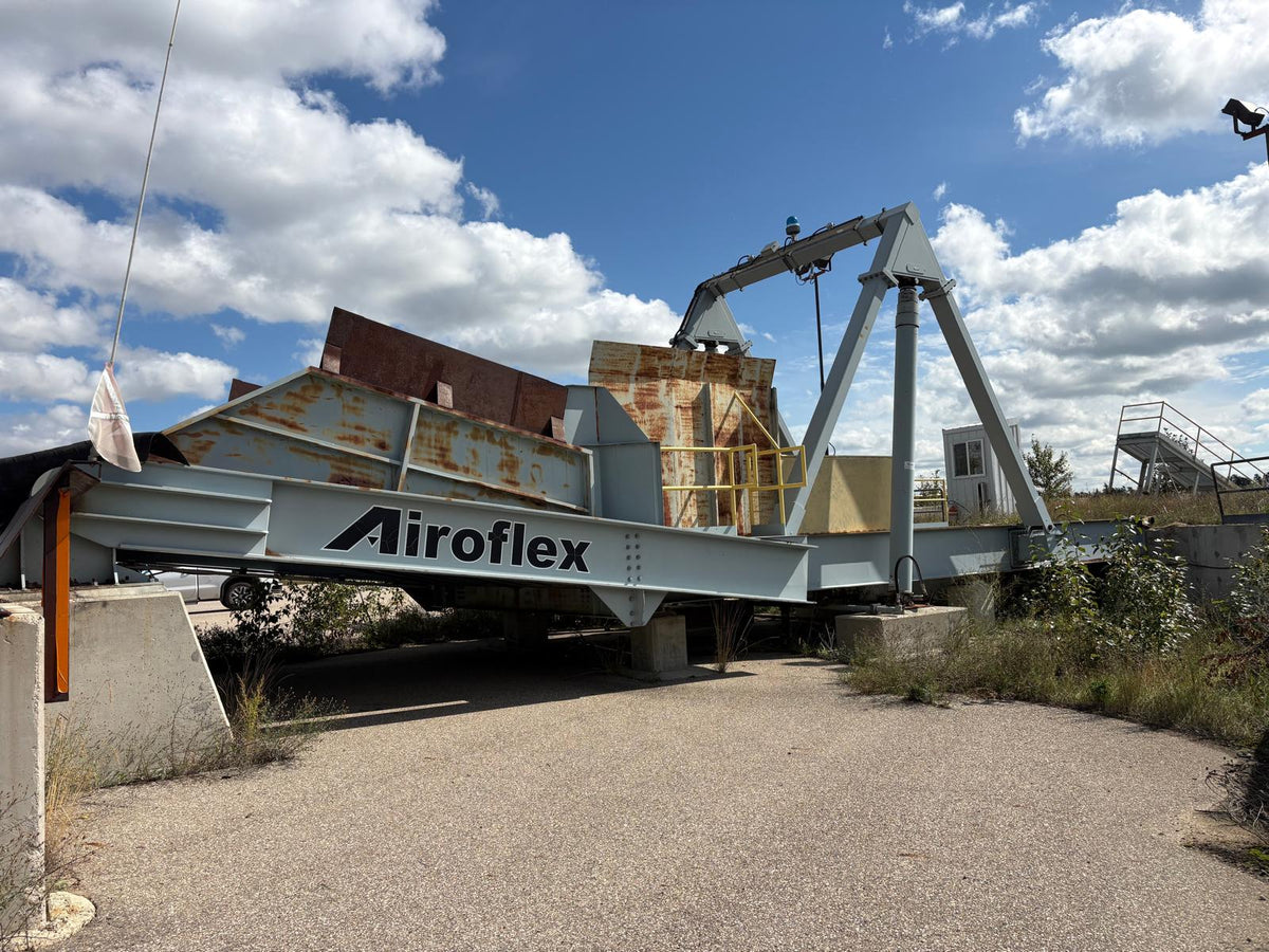 Airoflex 12-H-402-B-TS hydraulic truck dumper; receiving hopper excluded from sale.