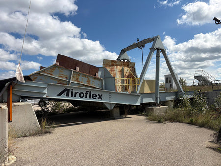 Airoflex 12-H-402-B-TS hydraulic truck dumper; receiving hopper excluded from sale.