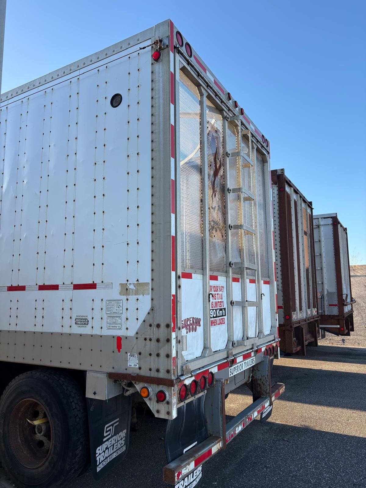 Rear angle of Superior aluminum chip trailer T-013, supplied September 2026