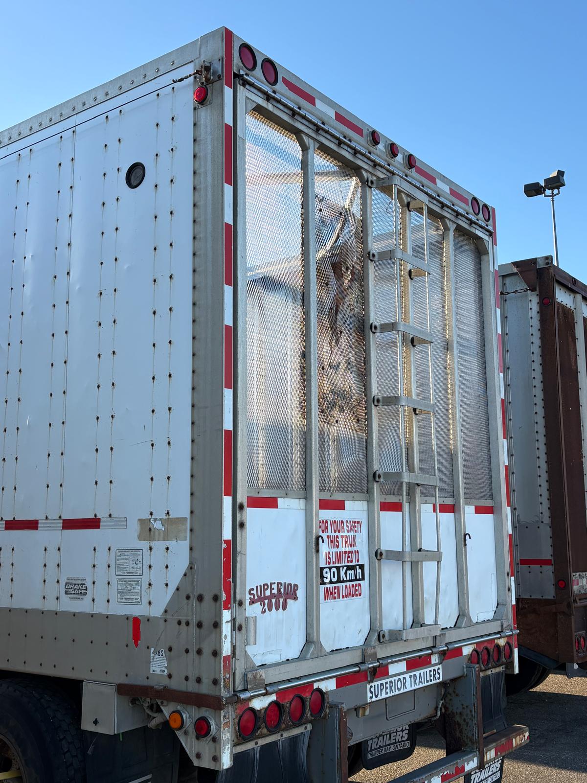 Rear doors of Superior aluminum chip trailer T-013, supplied September 2026